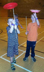 Two lads spinning plates in Penarth Leisure Centre