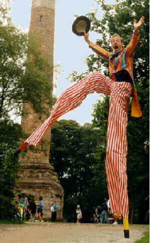 Kris performs a high kick on this tall stilts.