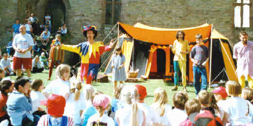 A huge audience watch the medieval entertainment at the Ludlow Festival of Crafts