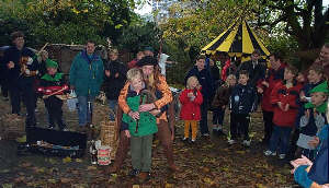 A young lad plays Wynndebagge's Bagpipes.