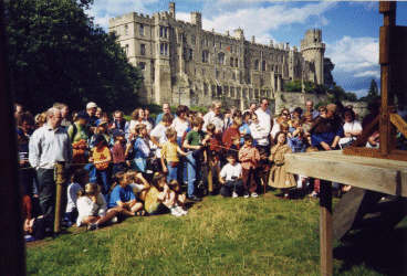 Bagshot ye Magician entertains a crowd at Warwick Castle.