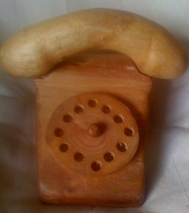 Carved wooden 'phone