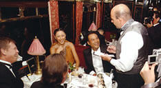 Hercule Poirot having dinner on the Orient Express