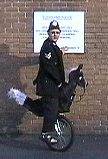 Mini Mansell on his "Horse Unicycle"